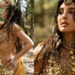 Model wearing layered golden tribal jewellery with bohemian-inspired accessories and traditional craftsmanship