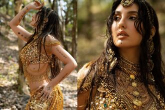 Model wearing layered golden tribal jewellery with bohemian-inspired accessories and traditional craftsmanship