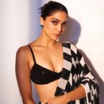 Sharvari on Building a Timeless Wardrobe: ‘I’ve Always Believed in Investing in Pieces You Can Wear Again and Again’ 10 26 08 19 123842 Sharvari poses wearing a watch as she discusses her personal fashion style